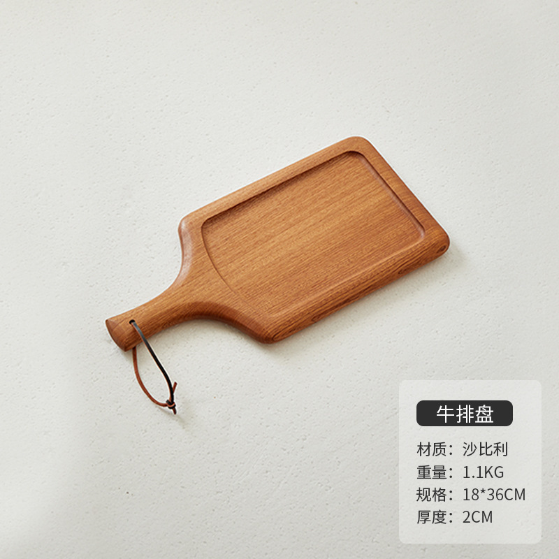木のステーキの食事皿日本式の木のピザの皿の牛の板の食器の木の皿の木のトレーの洋食は皿を並べます。|undefined