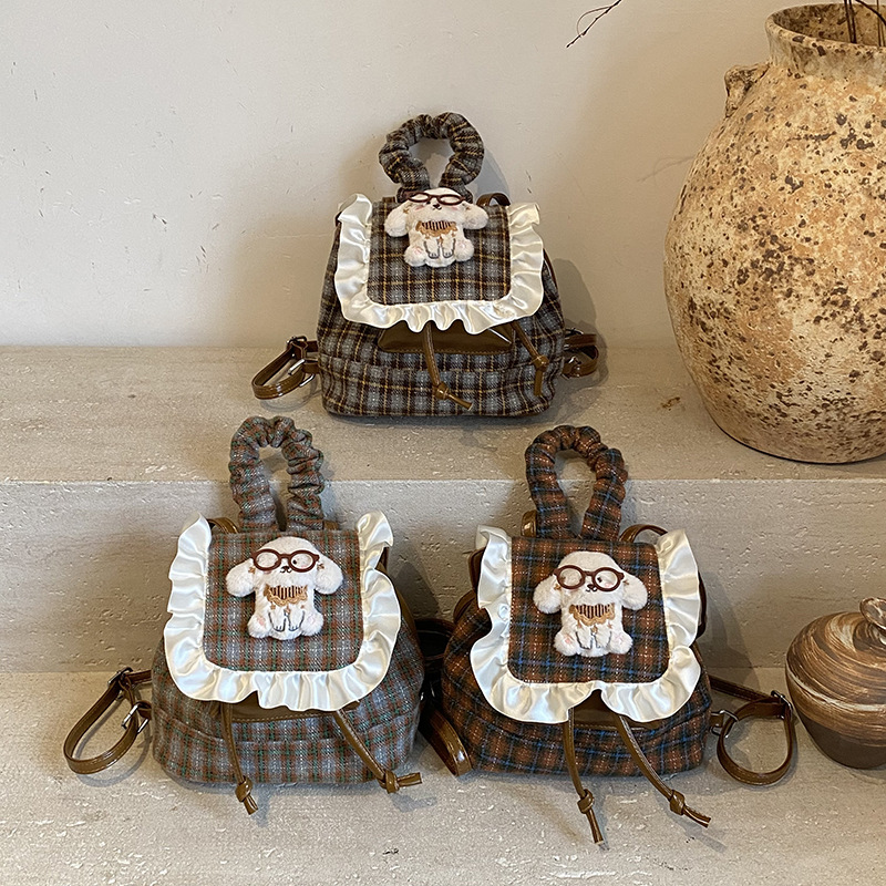 Otoño y invierno nueva mochila infantil coreana encaje mochila a cuadrícula para niños y niñas mochilas de dibujos animados cachorros mochilas de bebés