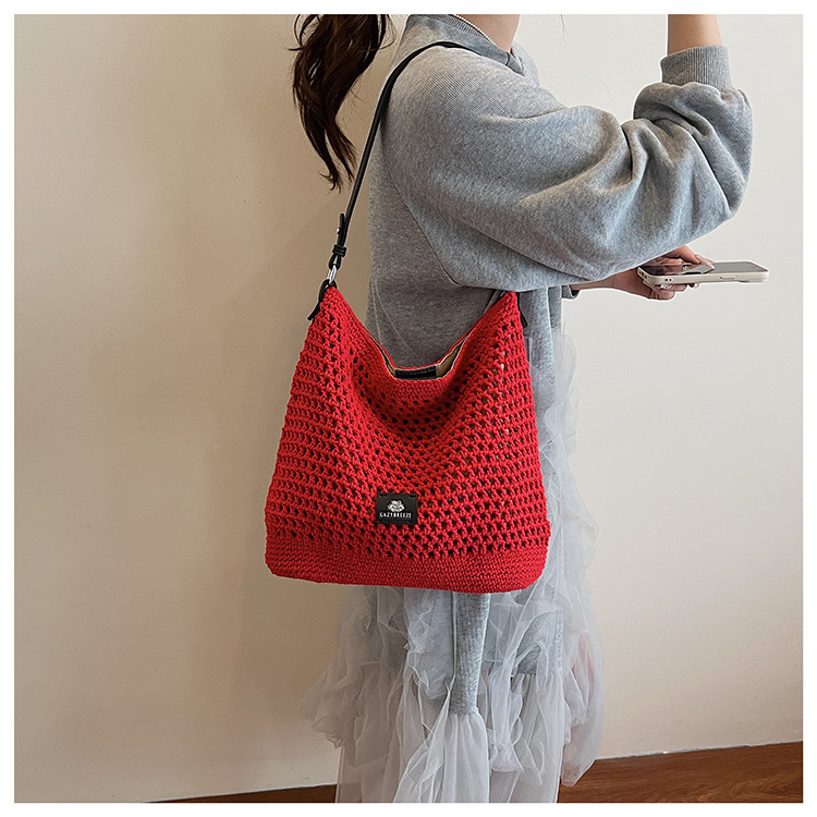 Summer hollowed-out knitted underarm bag for women, 2025 new style, laid-back and relaxed, seaside vacation style single-shoulder crossbody bag undefined