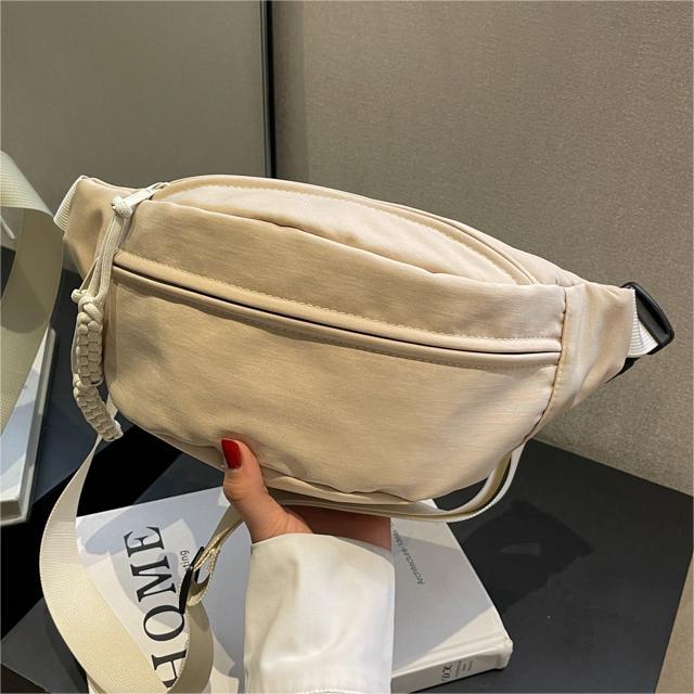 Bolso pequeño de lona simple casual para mujeres 2023 nueva moda bolso de mensajero del todo fósforo deportes de moda bolso de pecho de las mujeres bolso de la cintura