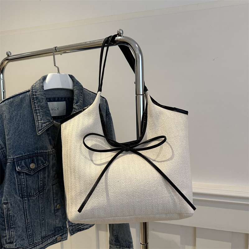 Bolsa de algodón y lino a rayas de gran capacidad para mujeres 2024 nueva bolsa de hombro universal de estilo extranjero