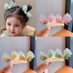 新しい真珠の立体の蝶結びのウサギの耳の赤ちゃんは小さい清新な泡の糸の子供のヘアピンのかわいい頭飾りを挟みます。