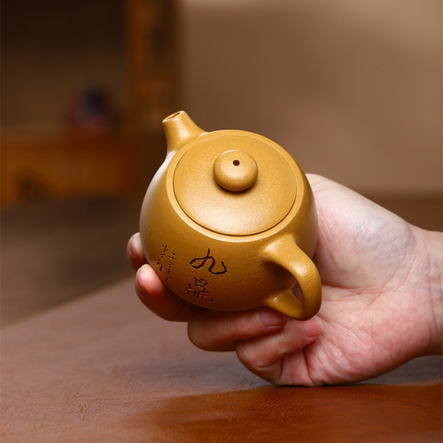 Yixing handmade purple clay pot wholesale live supply gift pot household raw ore section mud three-legged nine tripod pot