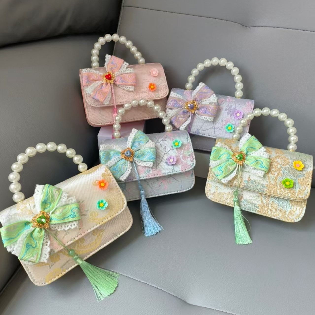 Bolsa portátil de la princesa de perlas estilo nacional arco de hombro bolso de cadena bolso pequeño bolso de cambio de Año Nuevo