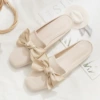 With bow, apricot, suede