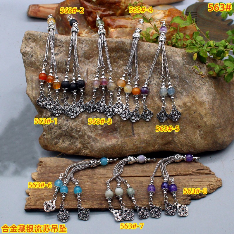 metal ethnic pendant with tassels