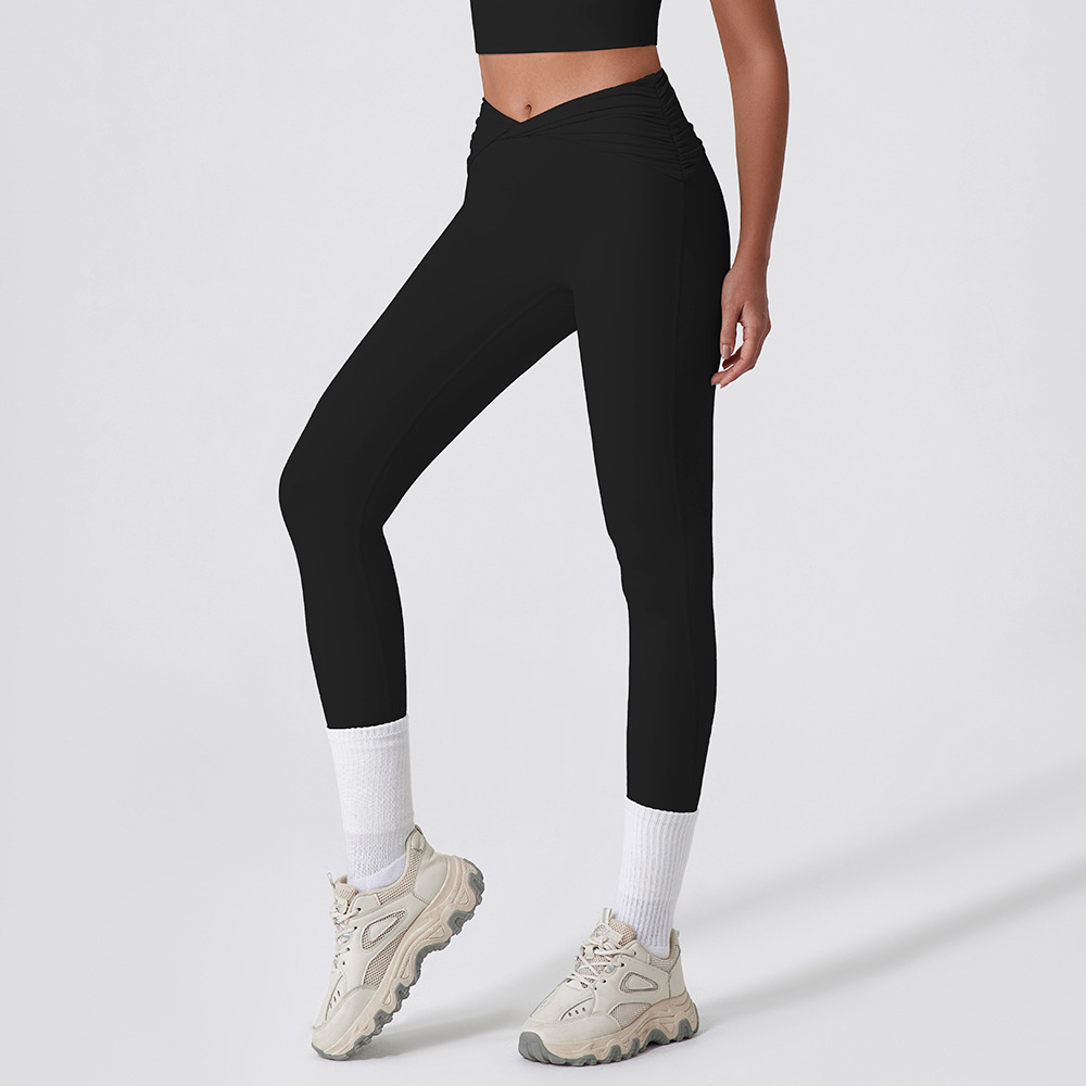 Europa y los Estados Unidos nuevos pantalones apretados rápidos y secos para mujeres torcer cintura alta y caderas pantalones deportivos para correr