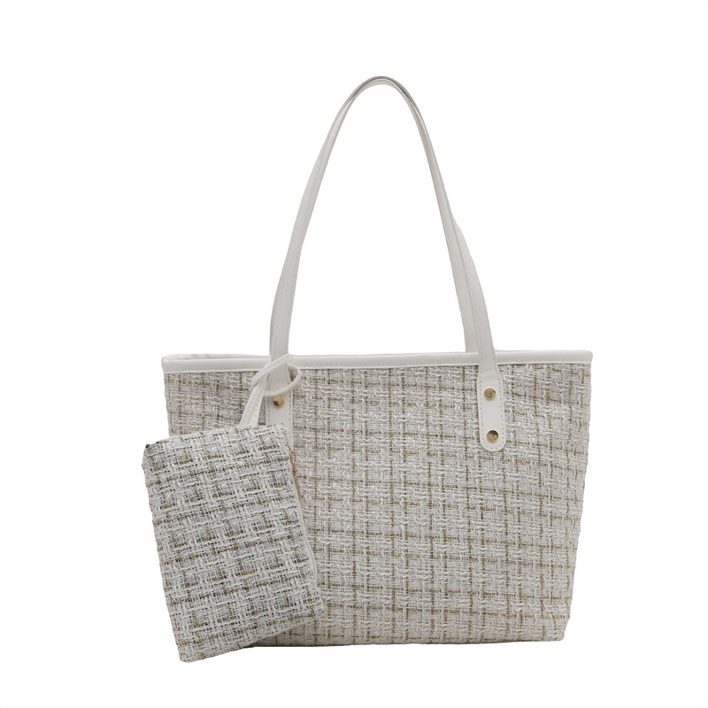 Bolso de mujer de moda de temperamento a cuadros de gran capacidad literaria 2025 primavera nuevo estilo coreano bolso de hombro de estilo occidental bolso de axila de moda