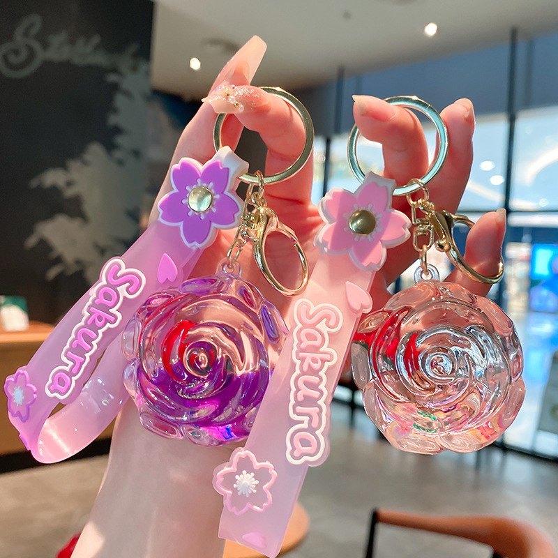 Iteret Celebrity Oil Doll Liquid Sad Bottle Keychai For Wome Exquisite Cute Cartoo Rose Pedat Backpack_voghion.com