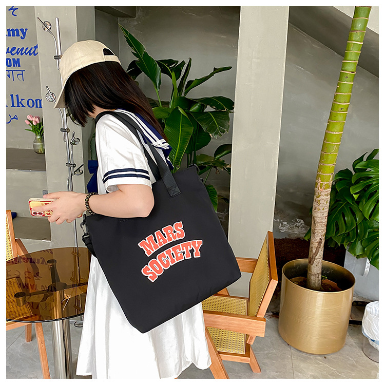 Canvas bag for women, single shoulder, ins crossbody, laid-back style, college student class bag, artistic Japanese style, large capacity, Hong Kong style, chic undefined
