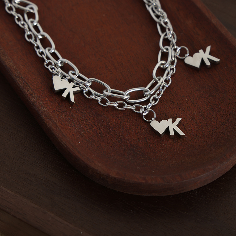Chino antiguo estilo nicho personalidad Cadena de doble capa cadena apilada estilo diseño amor OK colgante titanio pulsera de acero al por mayor hembra