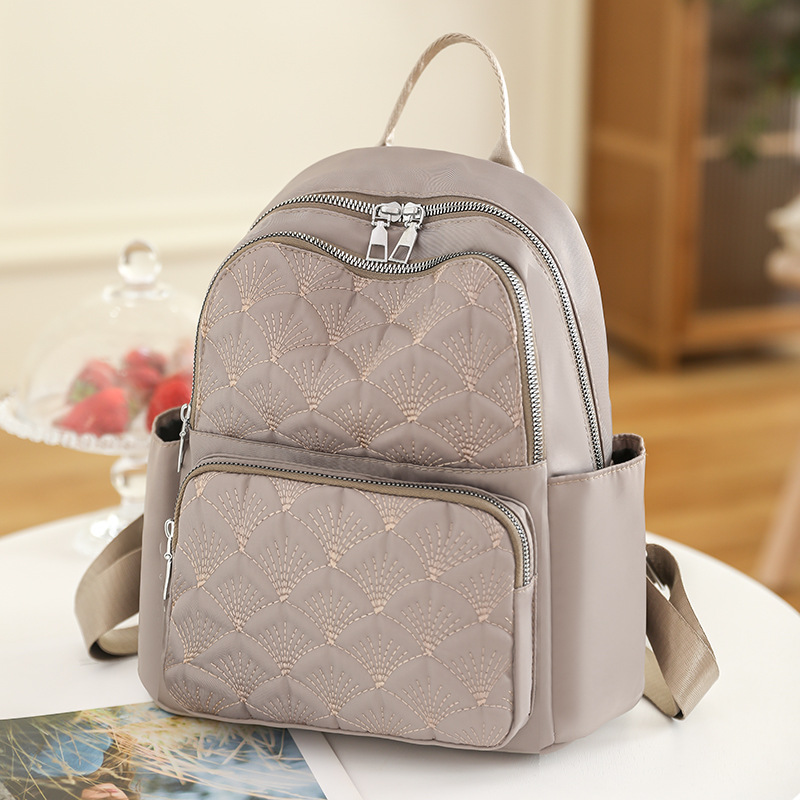 2023 nueva mochila de nailon para mujer coreana, mochila de viaje ligera al aire libre bordada de moda, mochila escolar para estudiantes de secundaria