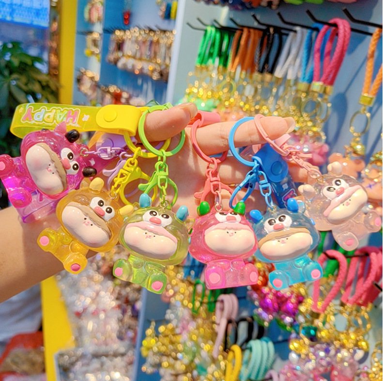 Caricatura Lilith dragón lindos colgantes de resina transparente bolsos de automóviles colgantes de llaves al por mayor