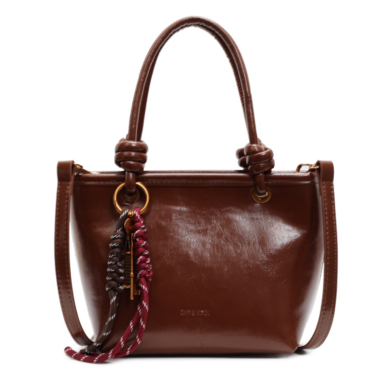 Alta sensación retro bolso para mujeres 2024 nuevo estilo versátil tendencia bolso de hombro bolso explosivo bolso de cubo portátil