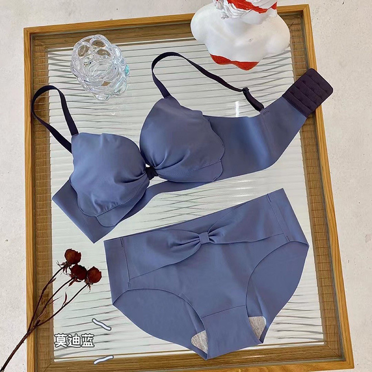 El otoño y el Invierno nuevo color puro de la muchacha las mujeres ropa interior cómoda inalámbrico pequeño pecho lado cierre profundo V empuja hacia arriba el sujetador traje 8282