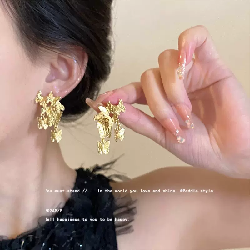 群碟飞舞金色耳环女复古轻奢高级感小众设计耳钉绝美灵动中古耳饰