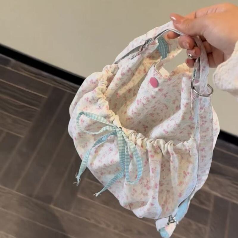 春夏の花の新型のかわいいしわの蝶結びのリュックサックのリュックサックの斜め掛けの多機能の女性のカバンの通勤|undefined