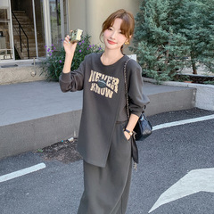 アルファベットのプリントのカジュアルなスーツのスカートの女性2025年の春の新型のファッションの半袖のtシャツのハイウエストの半身のスカートの2つのセット