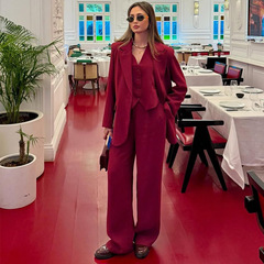 2025春の越境欧米の外国貿易の婦人服の馬甲のボタンの純色の広腿のズボンの気質の通勤のファッションのスーツ