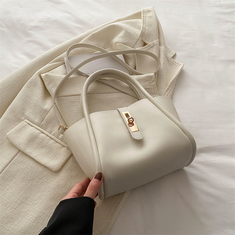 Textura de transporte simple bolso de moda coreano 2024 primavera nuevo estilo versátil in texturas mochila