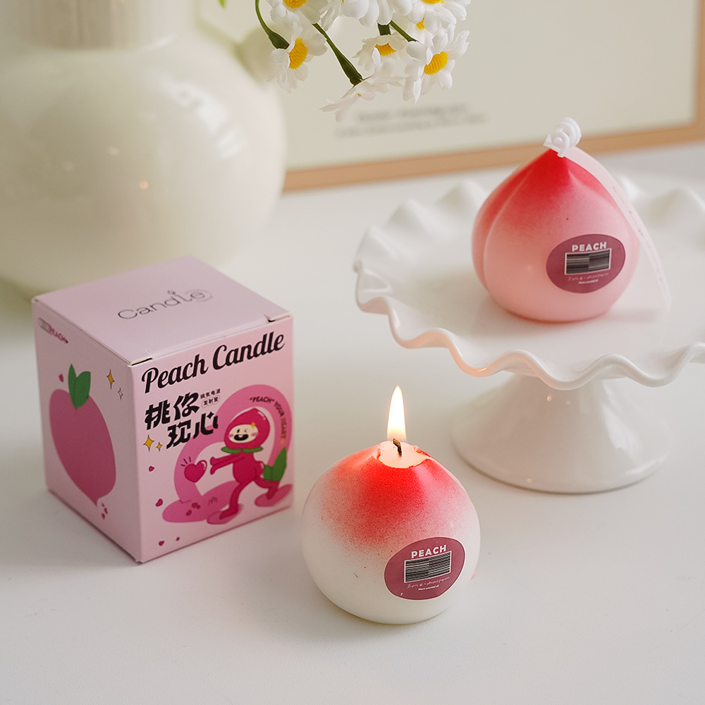 Fragancia hecha a mano Regalos de regalo de aroma de melocotón Adornos de velas con forma de fruta Velas con forma de fruta Regalo de ambiente transfronterizo