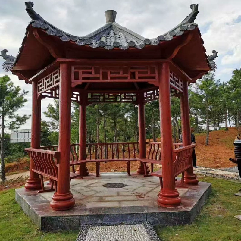 Производители занимаются цементным шестиугольным павильоном, имитацией деревянной набережной, железобетонной ландшафтной беседкой