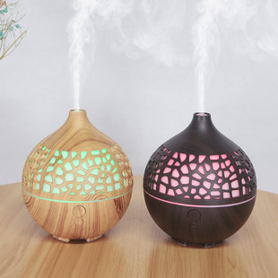 Mini essential oil aromatherapy machine New 5v humidifier hollow wood grain USB aromatherapy machine 180ml aromatherapy humidifier