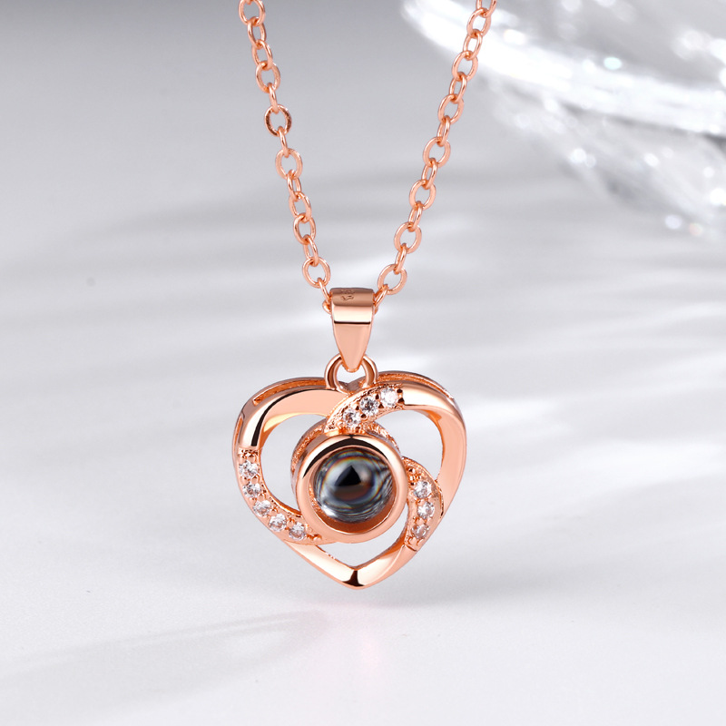 Cross-border Venta caliente amor memoria collar en forma de corazón colgante Femenino 100 idiomas te amo Cadena de clavícula