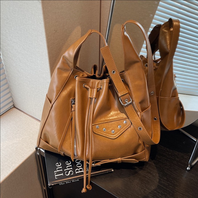 Bolso transfronterizo para mujeres otoño y invierno 2025, nuevo bolso de cubo de cuerda para mujeres, bolso de hombro de bolsillo para salir a la trayectoria.