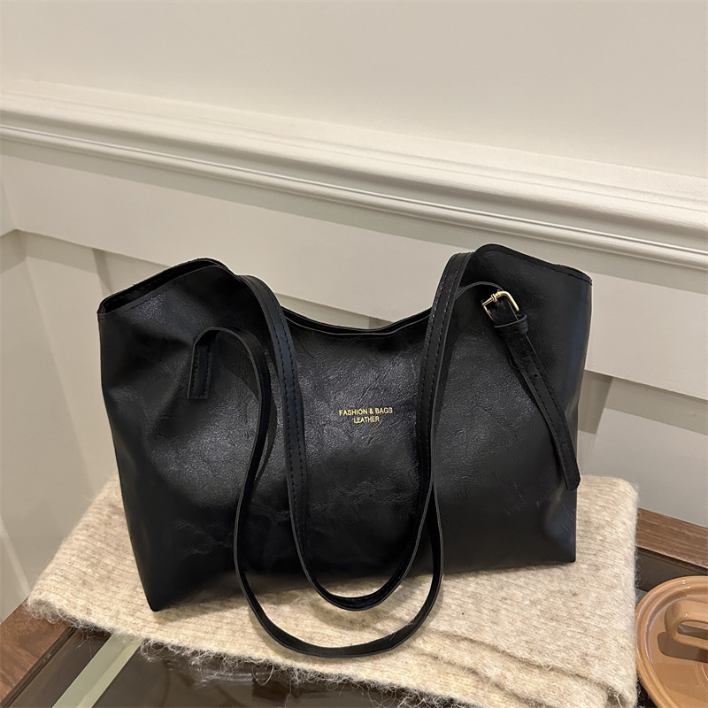 Retro 2024 invierno de mujeres nuevas bolsas de viaje de moda bolsas de hombro portátiles de moda simple bolsas de gran capacidad para mujeres