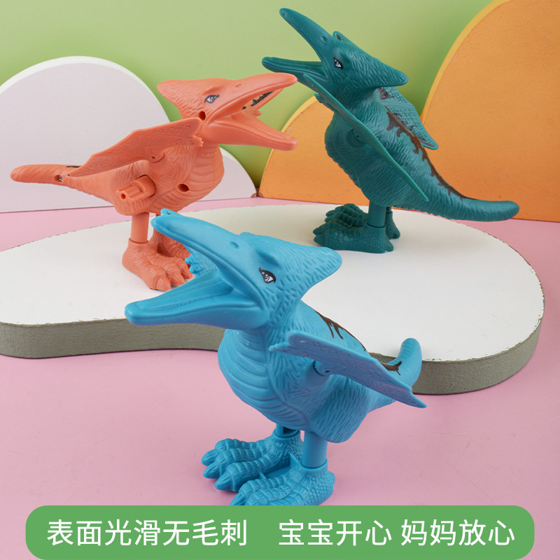 Juguete nostálgico de los niños simulación animal salto dinosaurio puesto en el mercado nocturno regalo suministro al por mayor