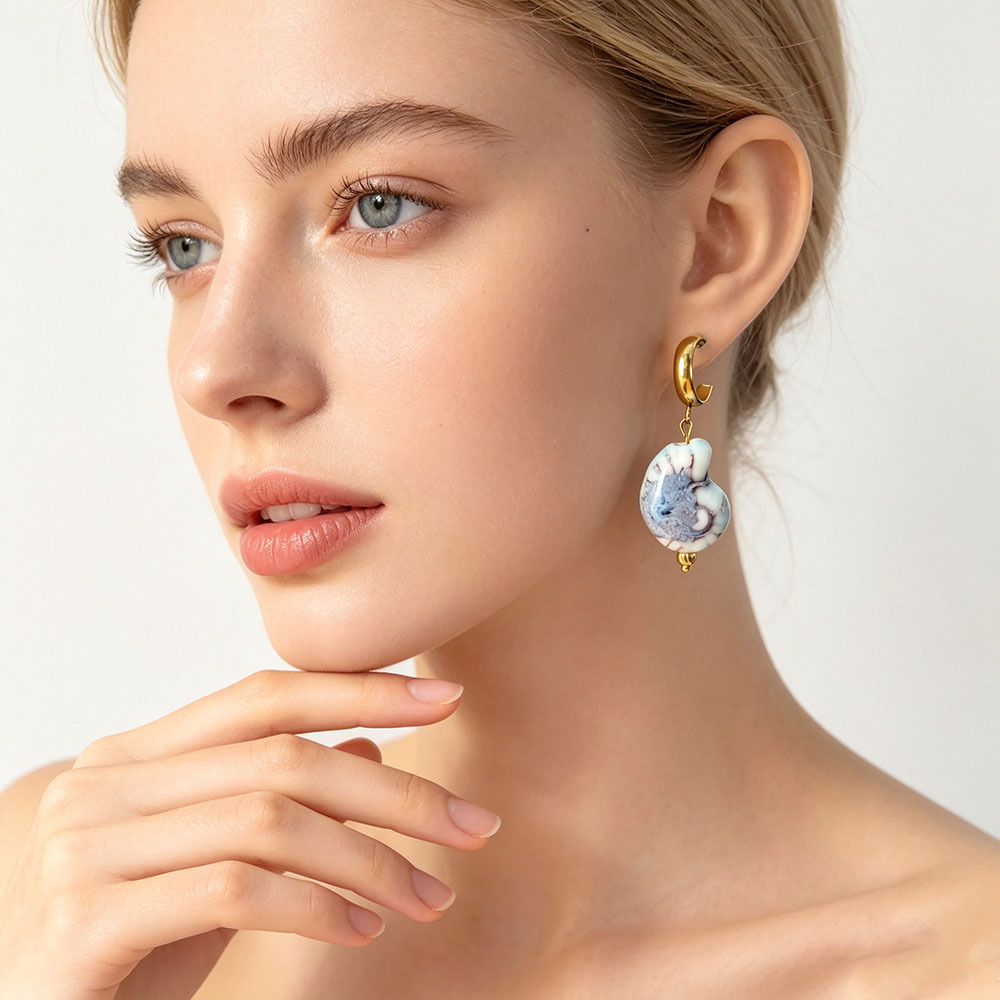Diseño único retro nicho de alta sensación pendientes de acero inoxidable flores animales pendientes irregulares joyas de lujo ligero