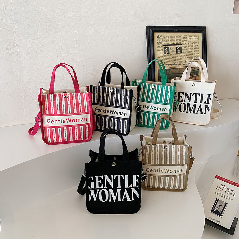 Moda rayas bolsa de lona para mujeres 2023 nueva carta impresión portátil bolsa de compras bolso de hombro al por mayor