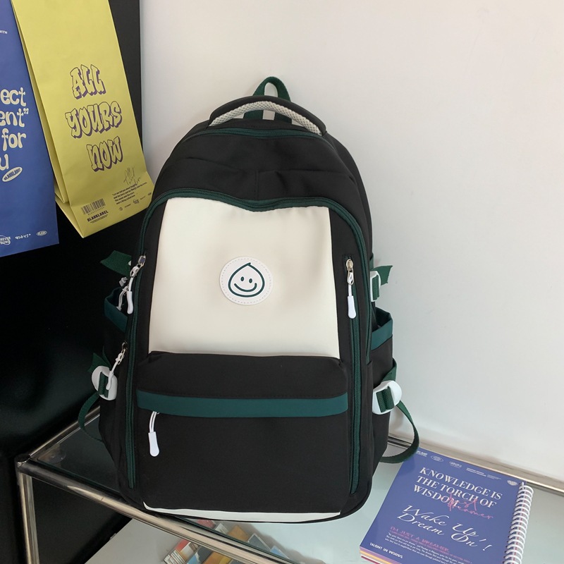 Mochila de lona coreana simple y versátil para mujeres 2023 nueva bolsa de gota de lluvia de gran capacidad mochila de ocio mochila de estudiantes