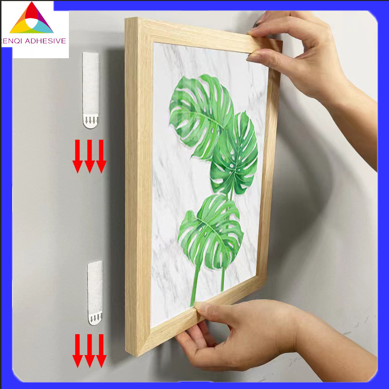 Clips adhesivos para marcos de fotos sin marco, para venta al por mayor transfronteriza, sin clavos, removibles, cinta de doble cara fácil de quitar, fuerte y altamente adhesiva.