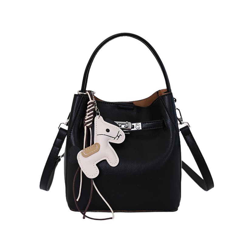 Bolsa de cubo de moda coreana para mujeres 2026 venta caliente nuevo lujo ligero versátil textura alta mochila de hombro