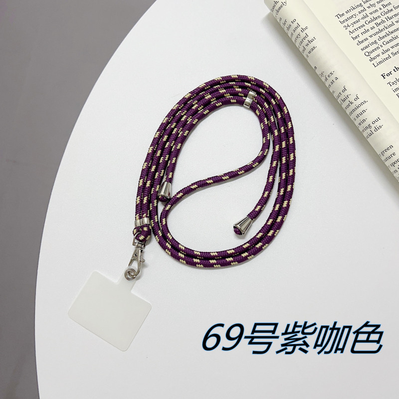 携帯ケースにナイロンのストラップが貼られています。|undefined