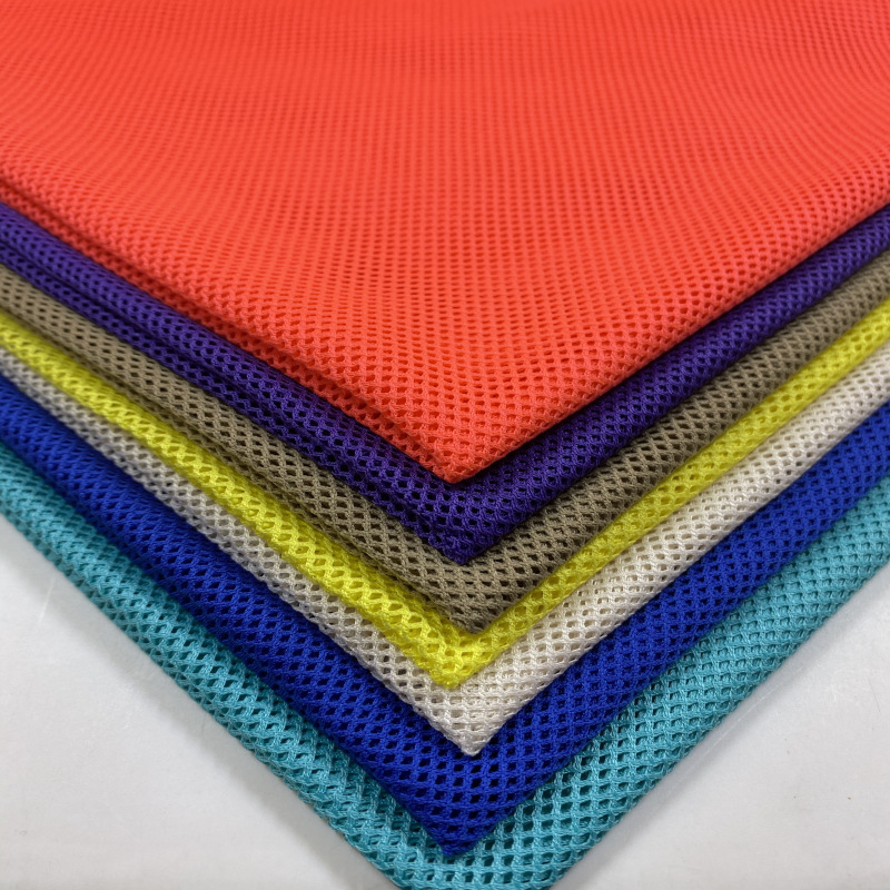 现货供应全涤75D低弹小四角网眼布料 校服运动服里布鞋帽箱包网布