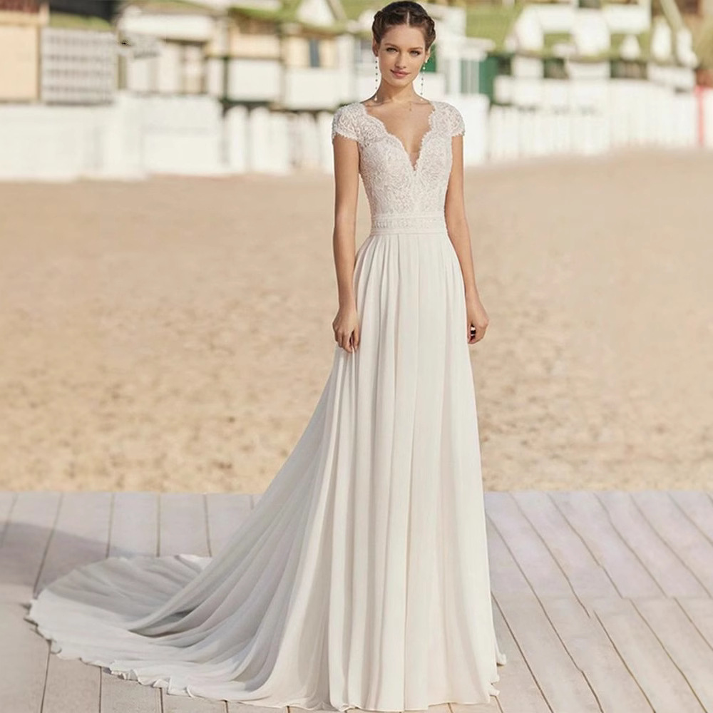 Europa y América simple vestido de novia ligero 2025 nuevo paquete de hombro delgado gran espalda de la novia de cola para salir a la foto