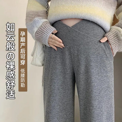 新型妊婦ズボン春秋外は高腰広脚ズボン2025春の大サイズストレートパンツを着ている