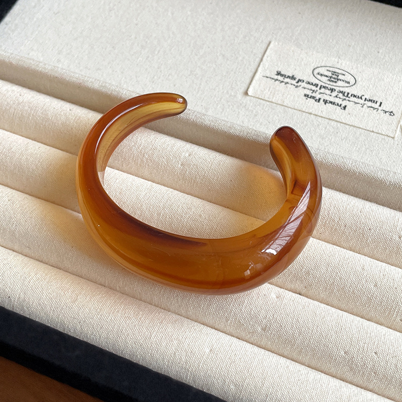 Pulsera de apertura geométrica florecientes de acrílico pulsera retro de todo fósforo de nicho, joyería de moda de alta gama de lujo ligero al por mayor