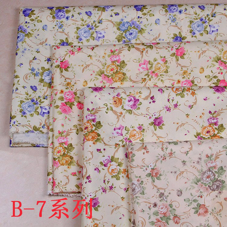 义乌厂家批发新款服装口袋包边布蓝红咖啡紫玫瑰桃皮绒花布面料