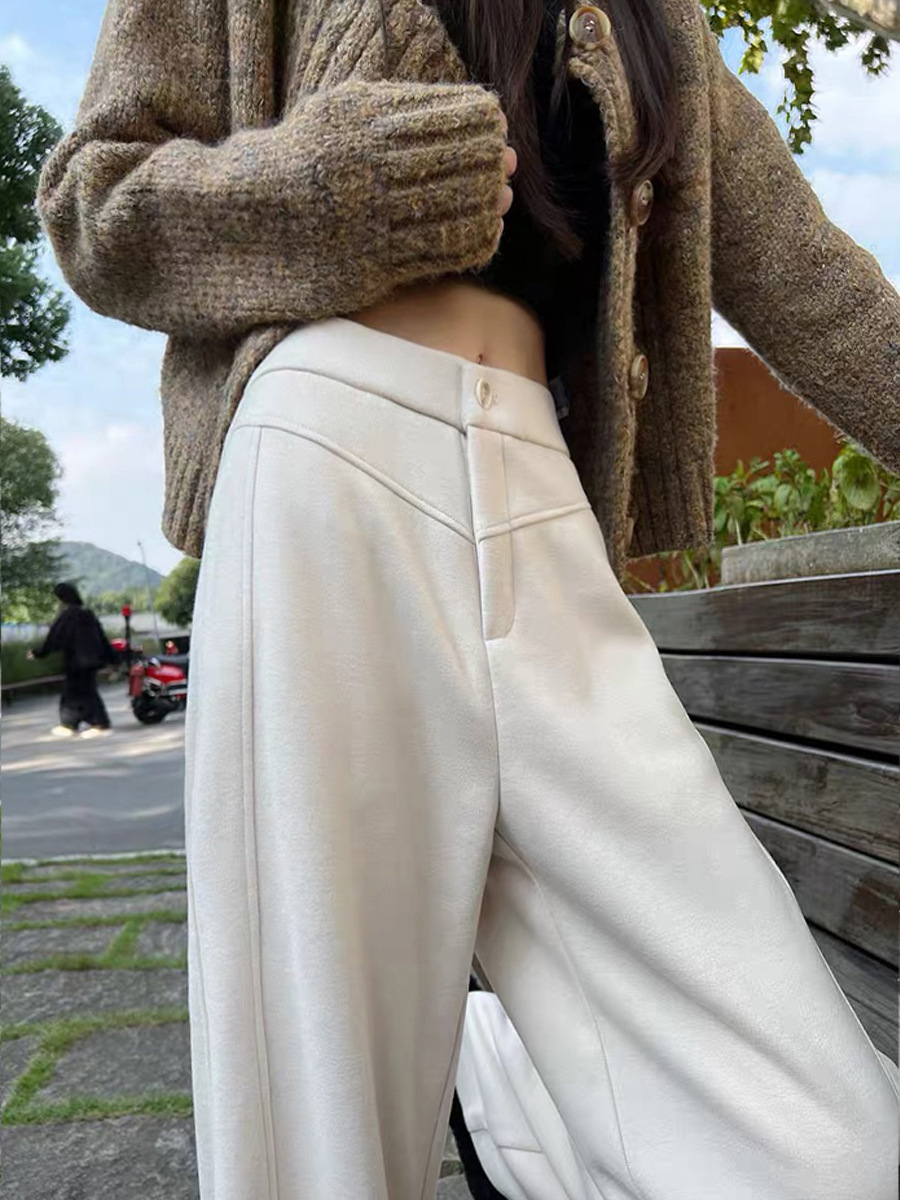 灰色のバナナのズボンの女性は秋冬に厚い直筒の狭い版の広い足のズボンのカジュアルなウールです。