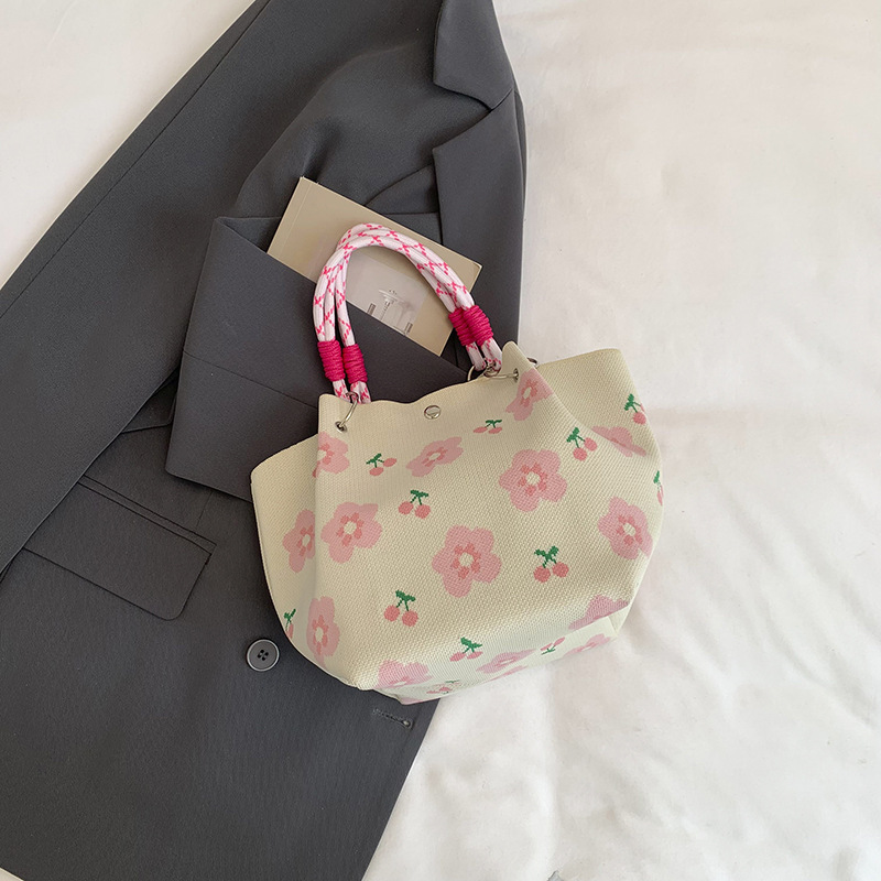 Bolsa de impresión coreana de niña nicho bolso de cubo de diseño diario versátil bolso de mano para estudiantes de viaje diario