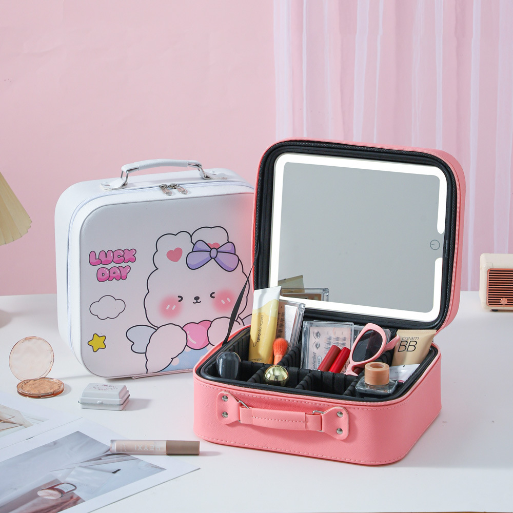 Nueva caja de maquillaje de dibujos animados con lámpara LED con partición maleta multifuncional portátil de gran capacidad de alto valor de maquillaje