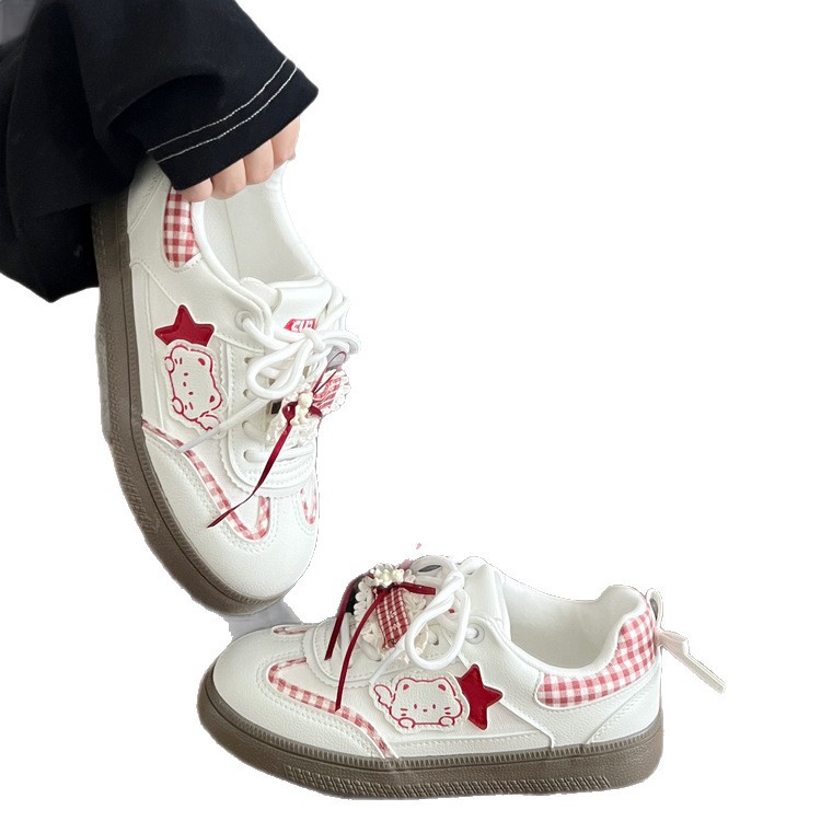 Zapatos de skate de arco para mujeres otoño de 2025 nuevos zapatos blancos transpirables de nicho para mujeres coreanas zapatos de entrenamiento moral para mujeres