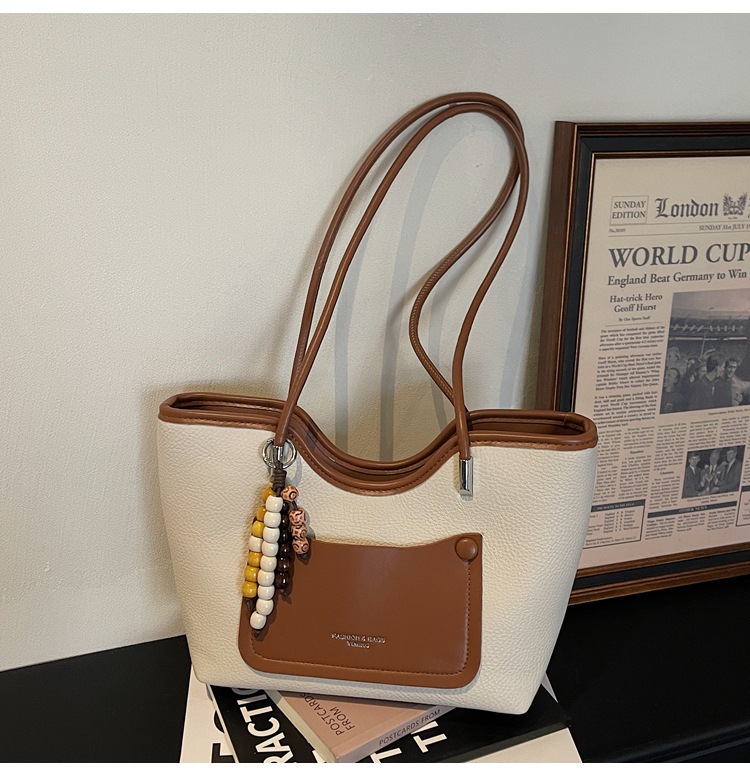 Bolsa de alta calidad retro de gran capacidad para mujeres 2026 nuevo paquete de textura ligera de lujo brazo de viaje ocio bolsa de mano image 11