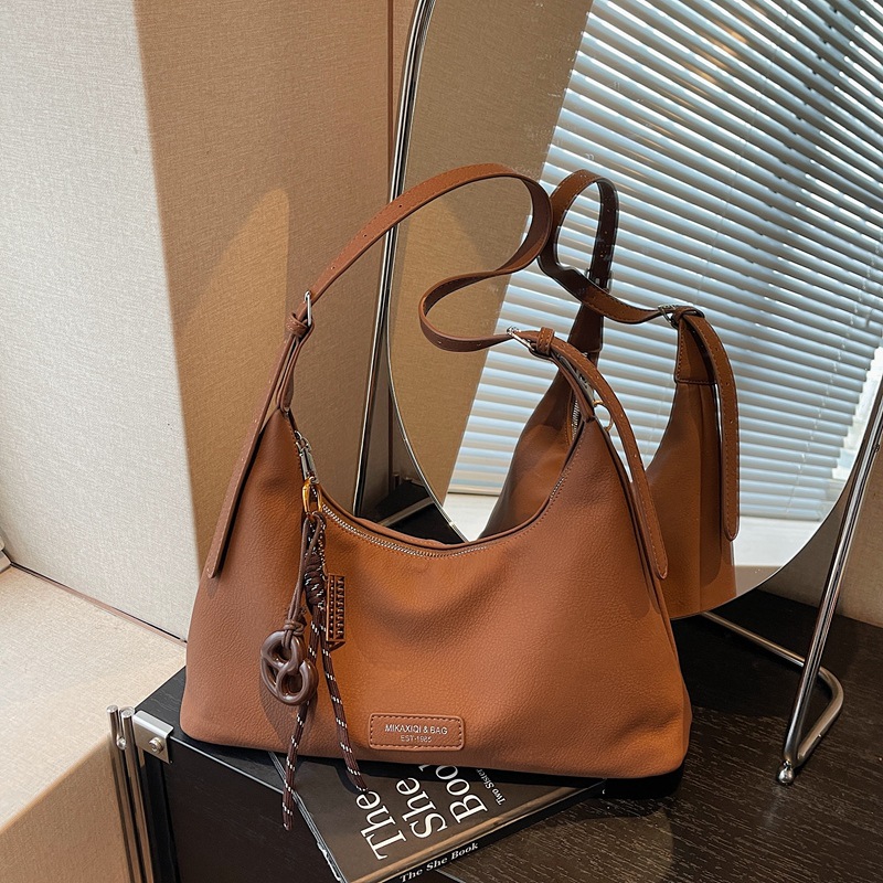 2025 nueva moda retro bolsas de brazo bolsas de viaje de mujer bolsas de mano de gran capacidad bolsas de mano bolsas de hombro simples y versátiles