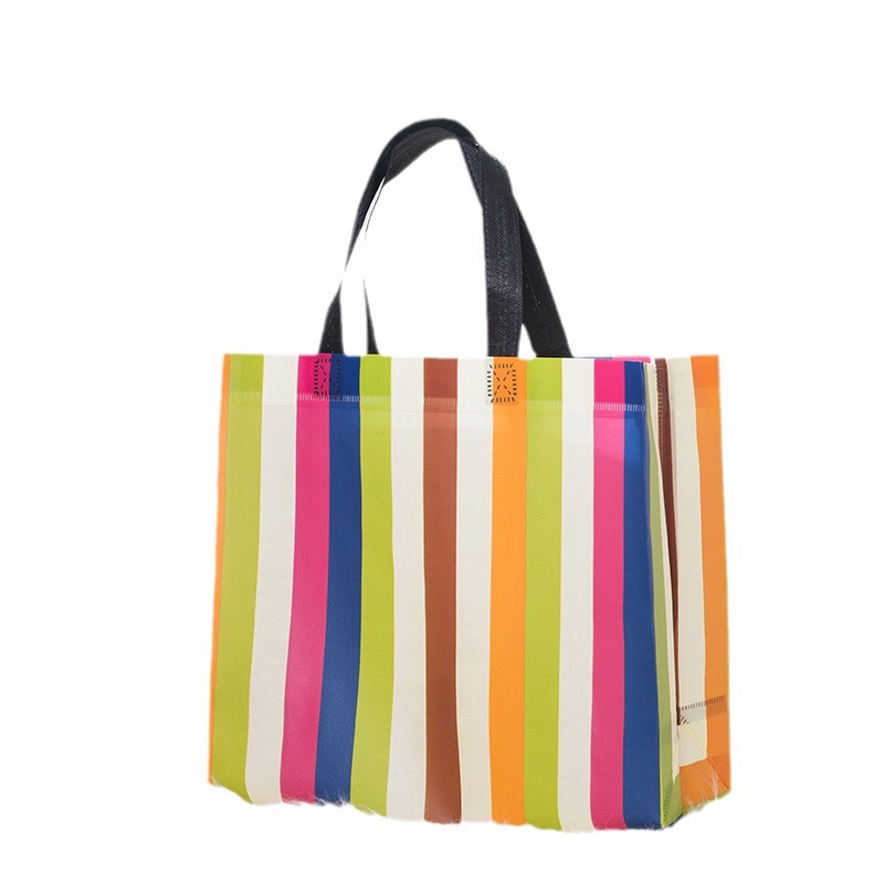 En stock bolso no tejido personalizado Impresión logotipo ropa publicidad bolsa color película no tejida