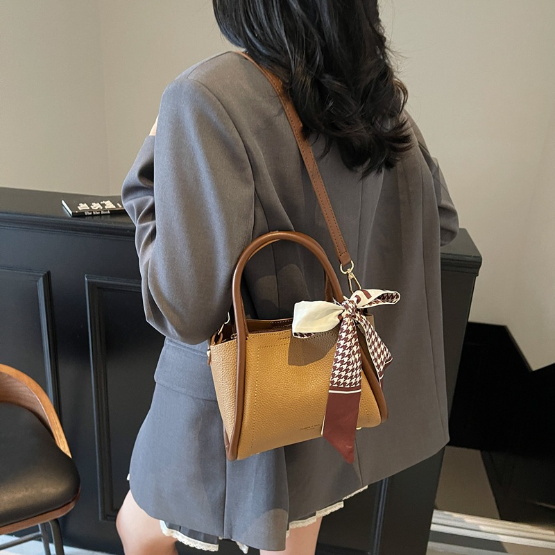 Nuevos productos transfronterizos más vendidos Bolso de cubo de mano para mujer 2025 Bolso de hombro popular salvaje Bolso femenino de canasta de verduras simple casual